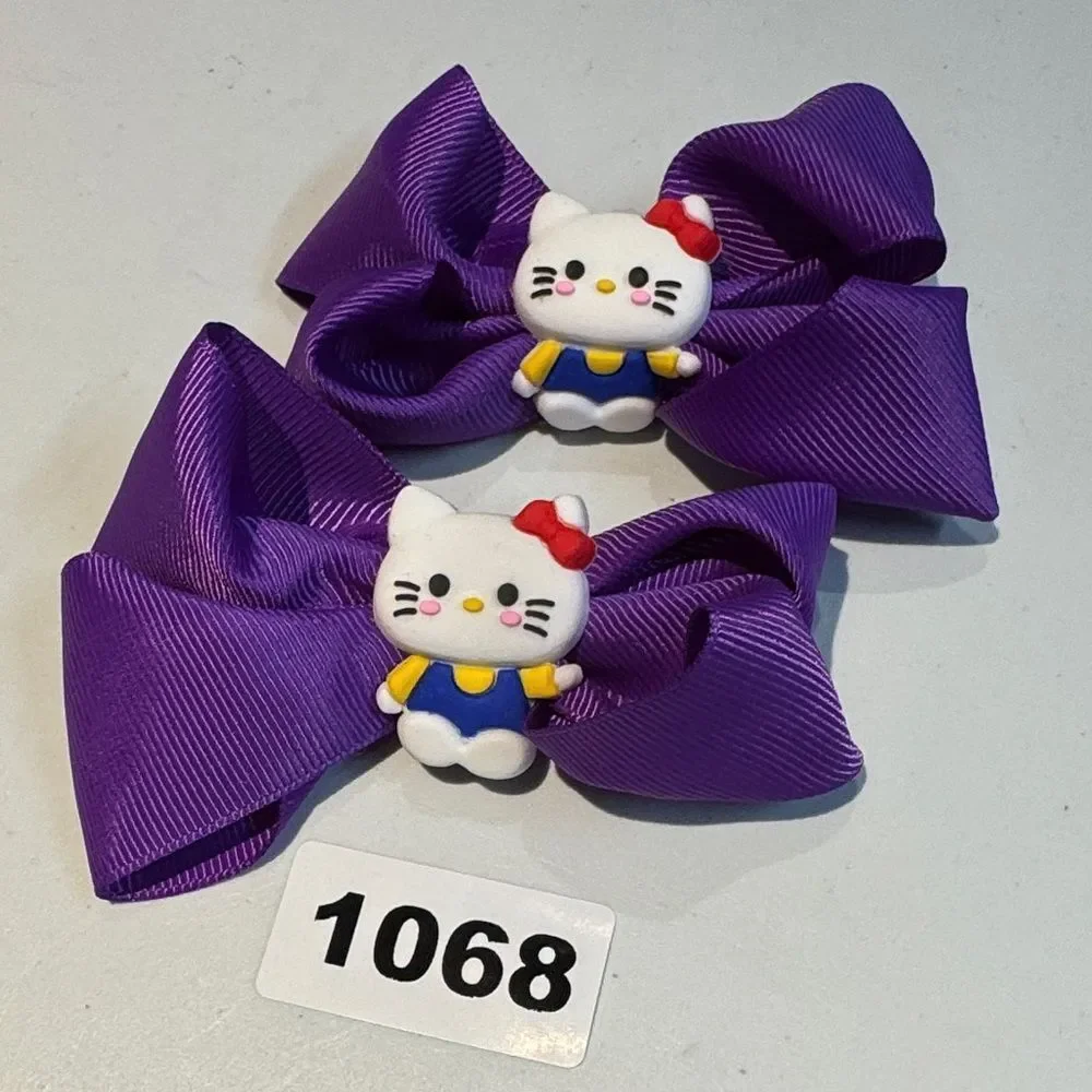 1068-Purple Color 2 Piece Set Hello Kitty Alligator Clip Hair Bows
